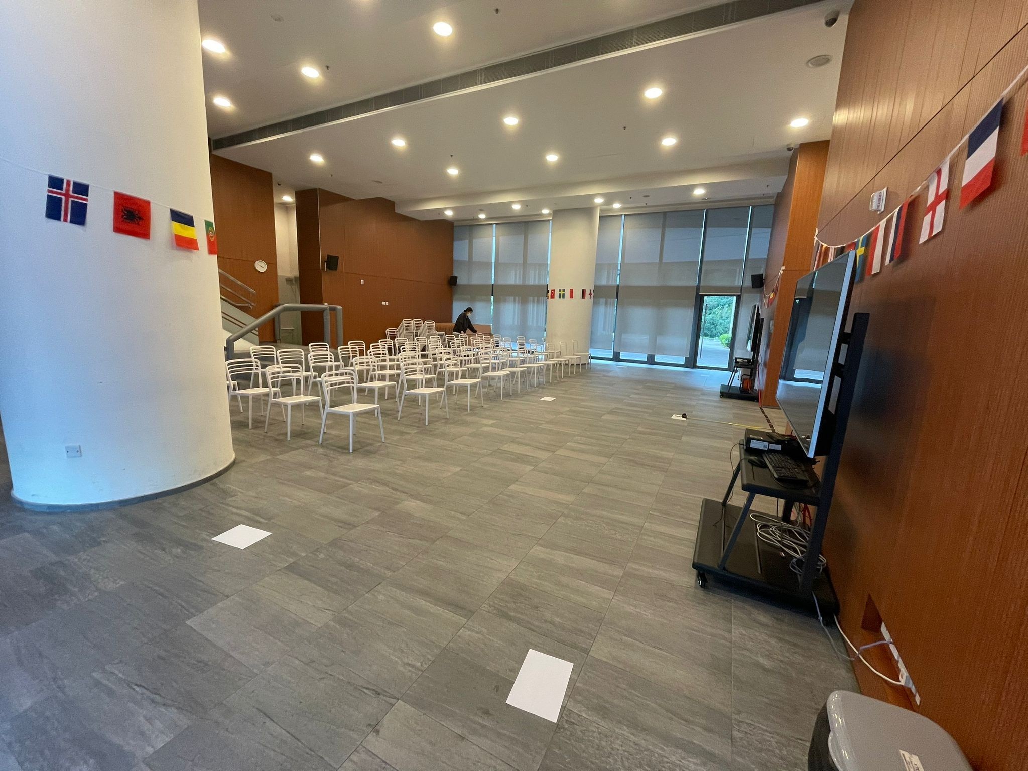 https://d26ql2nsjs5ylm.cloudfront.net/files/684c8252a6a8fb0002a99f39/8lqdmht4l-M2with30chairsandstagesetting_7.jpeg
